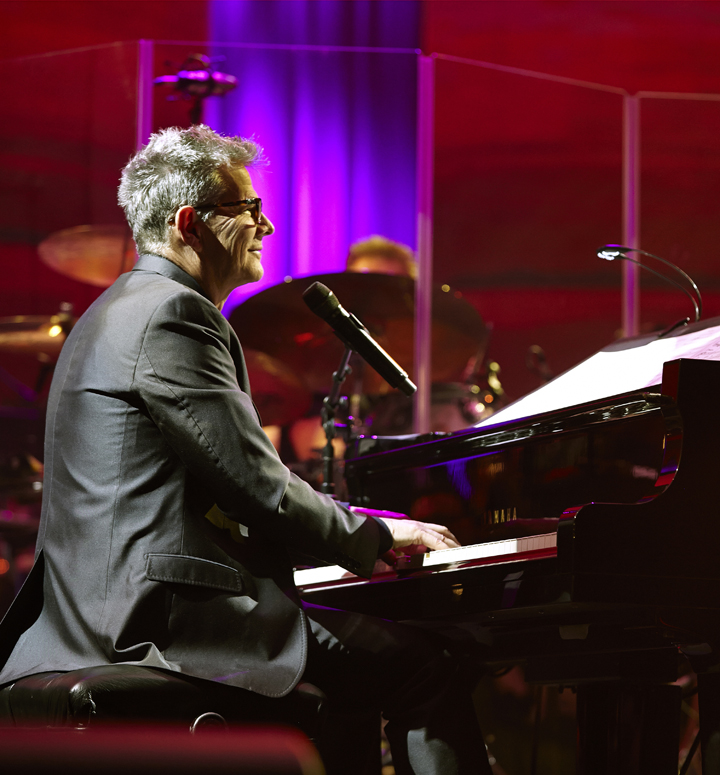 David Foster performs on piano